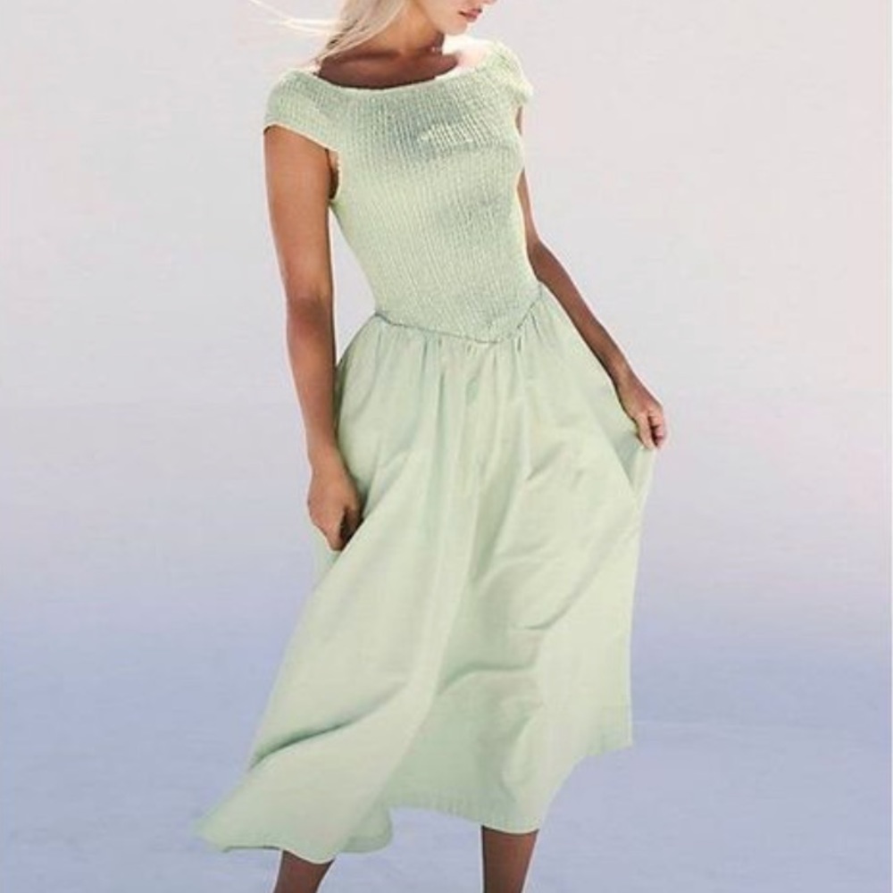 NWOT Ceci smocked midi dress by Free People in size Large